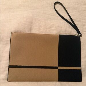 Rothy’s Black and Tan Clutch